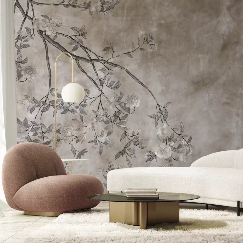 Fotobehang Boomtakken met bladeren op een betonnen achtergrond