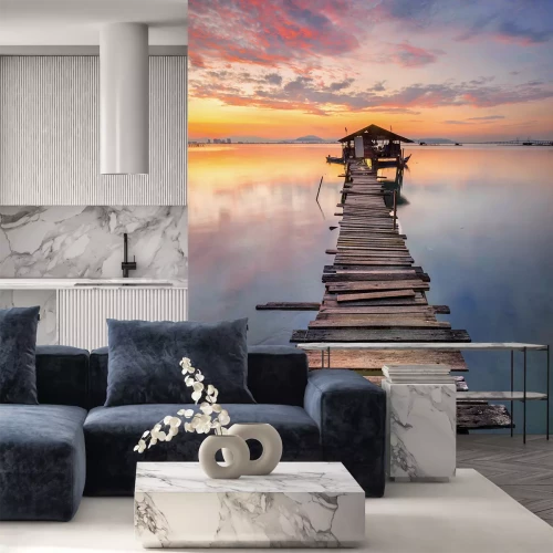 Sticker Houten steiger tegen de achtergrond van een zonsondergang