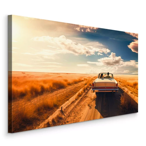 Canvas Een retro-cabriolet op een onverharde weg tussen het goudgele gras.