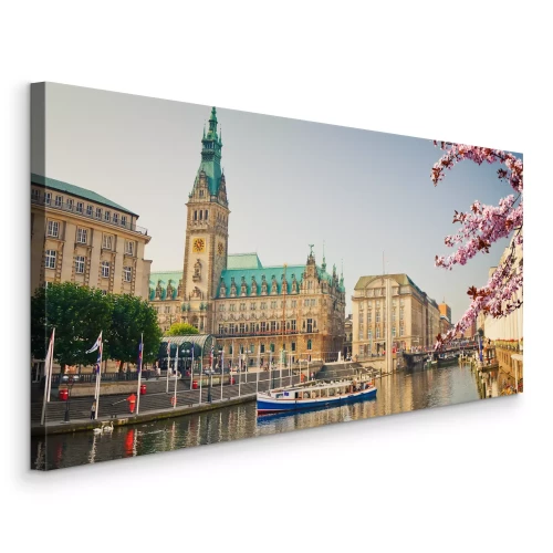 Canvas Lentegezicht op het stadscentrum van Hamburg met een boot op het water