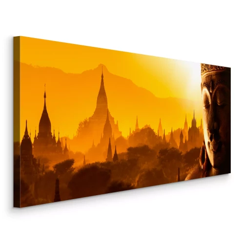 Canvas Boeddha met tempels op de achtergrond bij zonsondergang