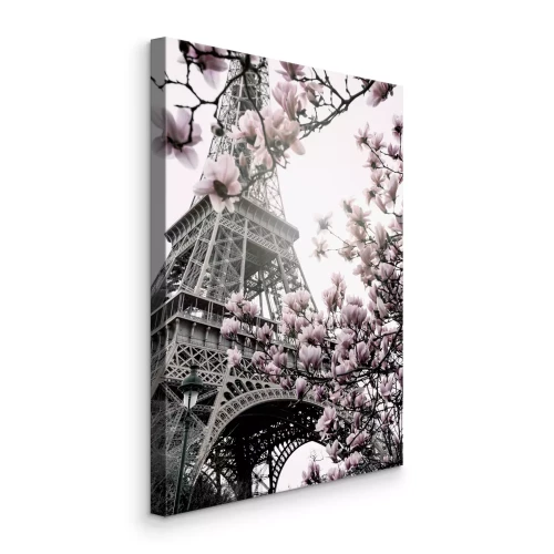 Canvas Bloeiende magnolia&#39;s tegen de achtergrond van de Eiffeltoren