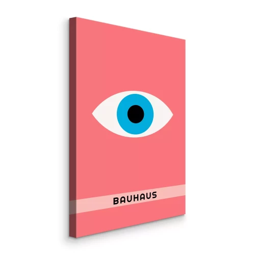 Canvas Een minimalistisch oog met het Bauhaus-opschrift op een roze achtergrond.