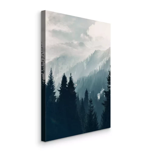 Canvas Mistig berglandschap met bos bij zonsopgang