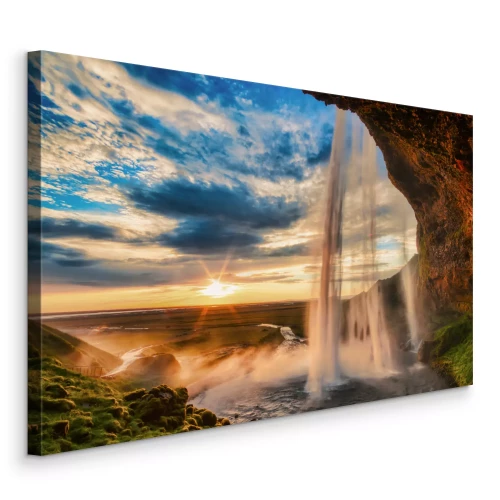 Canvas Een waterval die langs een klif stroomt