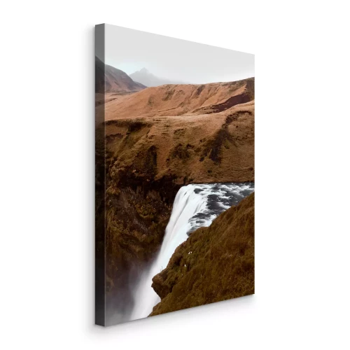 Canvas Waterval op roestige rotsen