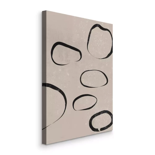 Canvas Minimalistische zwarte hoepels op een beige achtergrond
