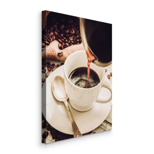 Canvas Een kopje gevuld met koffie met granen op de achtergrond