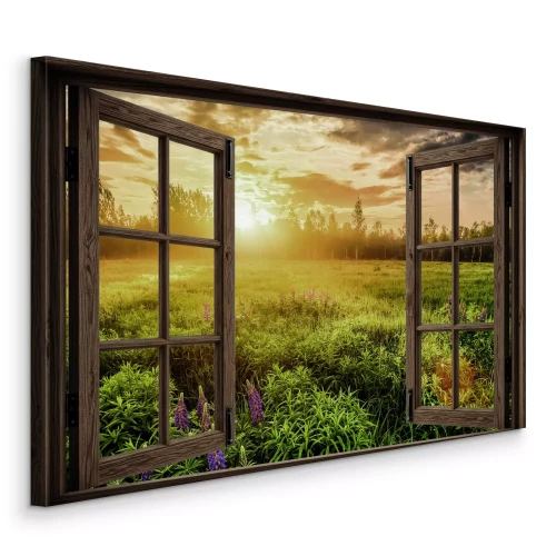 Canvas Het gouden licht van de ondergaande zon verlicht de weide en het bos