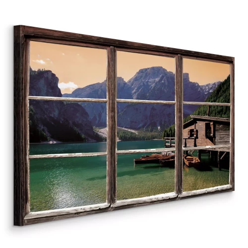 Canvas Houten steiger en boten tegen de achtergrond van bergen