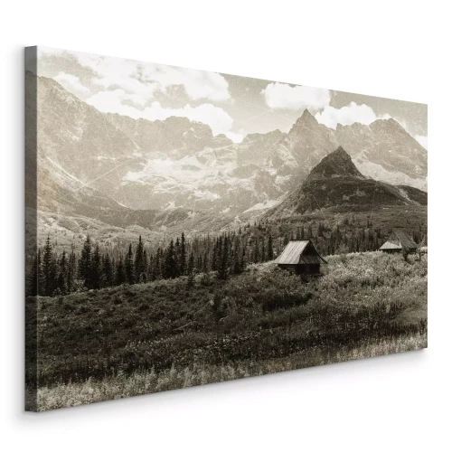 Canvas Weelderig berggroen rondom rotsachtige pieken