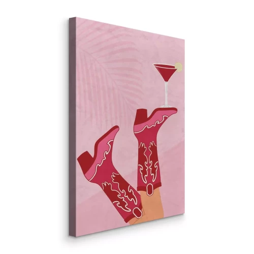 Canvas Stijlvolle vrouw met een drankje op haar laarzen