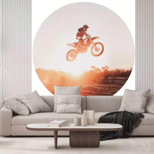 Sticker Motocrossrijder tegen de achtergrond van de zonsondergang