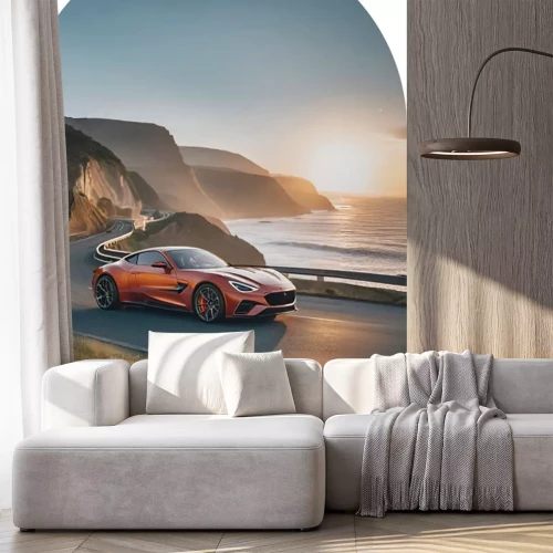 Sticker Een sportwagen tegen een zonsondergang.