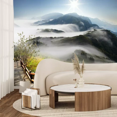 Sticker Dramatische wolken met berg en boom