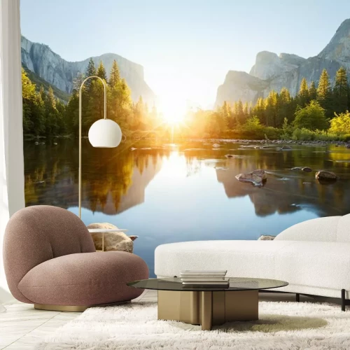 Fotobehang Zonsopgang in een bergdal