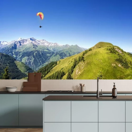 Fotobehang Paragliding boven de bergen