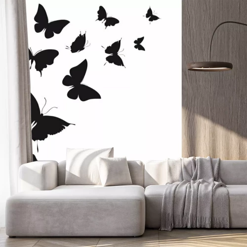 Fotobehang Zwarte vlinders op een lichte achtergrond