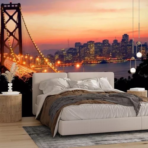 Fotobehang Hangbrug met panorama van de stad bij nacht