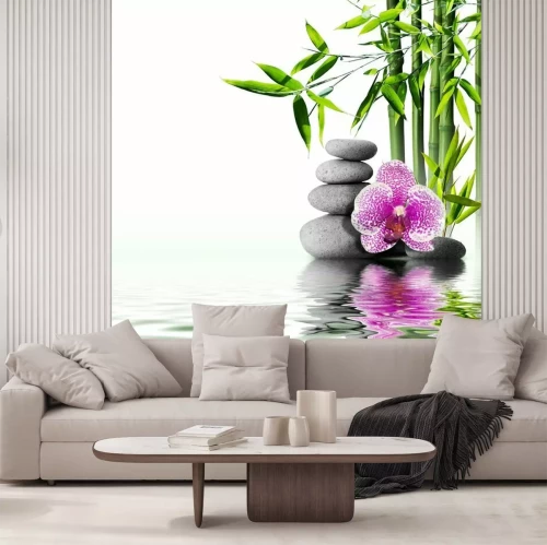 Fotobehang Orchidee samenstelling van stenen en bamboe