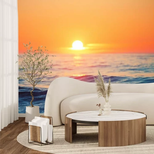 Fotobehang Zonsondergang over de oceaan en golven