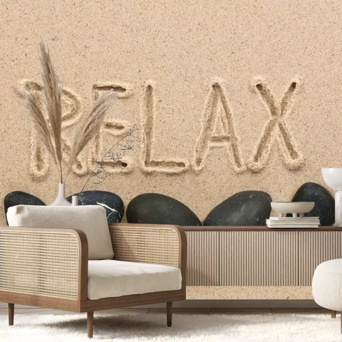 Sticker Word ontspannen geschreven op het zand