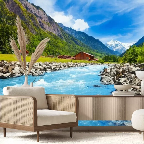 Fotobehang Zwitsers landschap met rivier en huizen