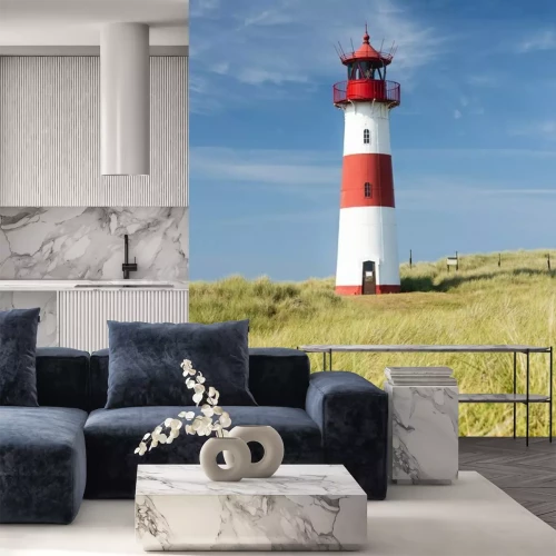 Fotobehang Vuurtoren op groen gras