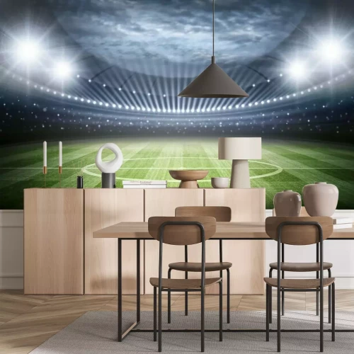 Fotobehang Uitzicht op het veld en het stadion, verlicht door schijnwerpers.