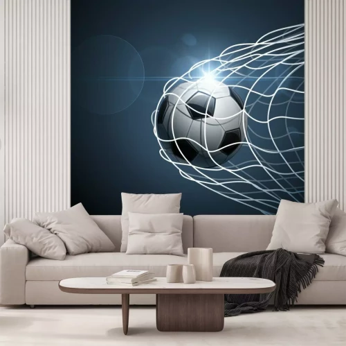 Fotobehang De bal die het doel ingaat tegen een marineblauwe achtergrond