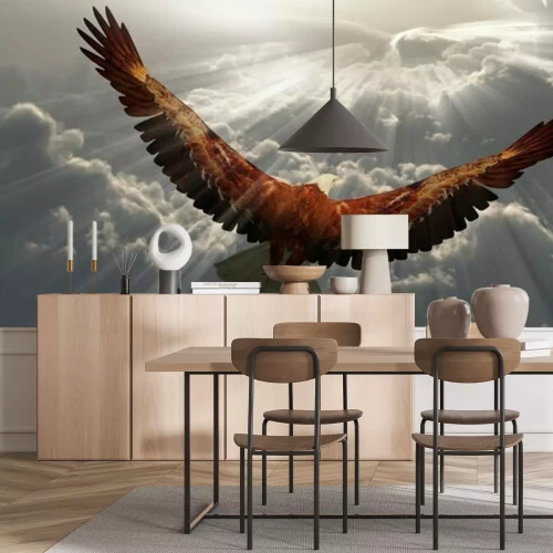 Fotobehang Een adelaar die boven de wolken vliegt