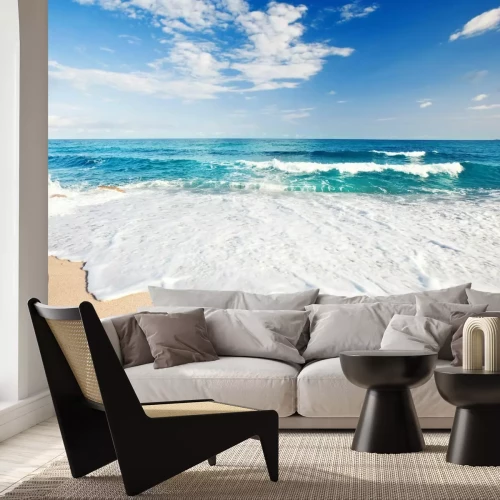 Fotobehang Kust met zand en kalme golven