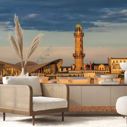 Fotobehang Vuurtoren Warnow monding bij zonsondergang