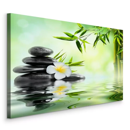 Canvas Zwarte stenen met plumeria en bamboe ondergedompeld in water