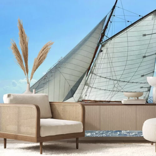 Fotobehang Een schip met zeilen op zee