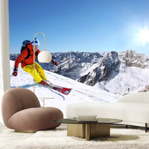 Sticker Skier ski afdaling in het hooggebergte tegen zonsondergang