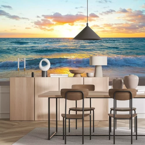 Fotobehang Strand bij zonsondergang met uitzicht op de oceaan