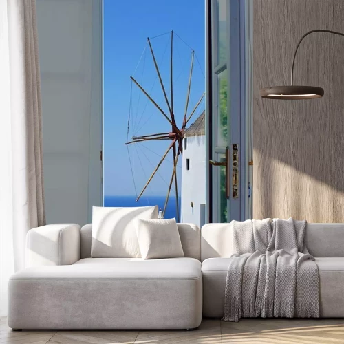 Fotobehang Balkondeur met een prachtig uitzicht op het eiland Santorini, Griekenland