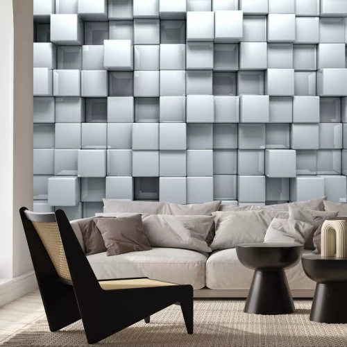 Fotobehang Een opstelling van witte kubussen die op pixels lijken