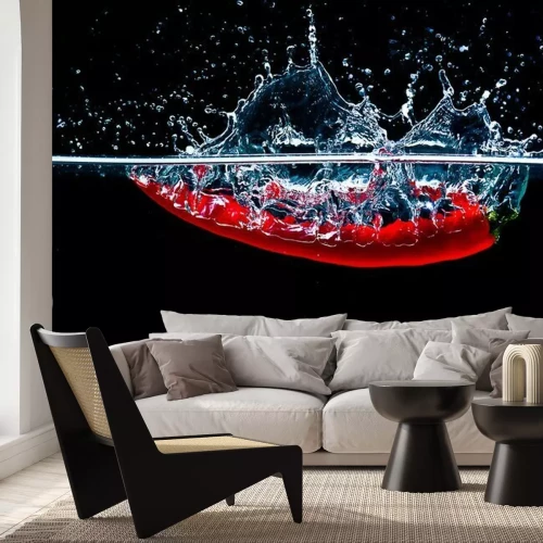 Sticker Rode peper die in het water valt