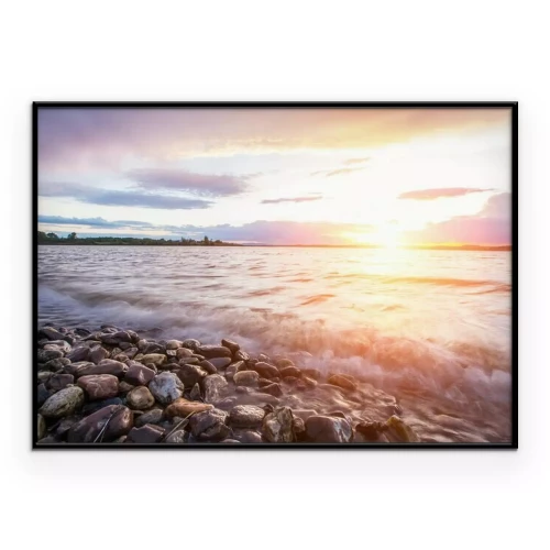 Poster Zonsondergang boven de rotsachtige kust