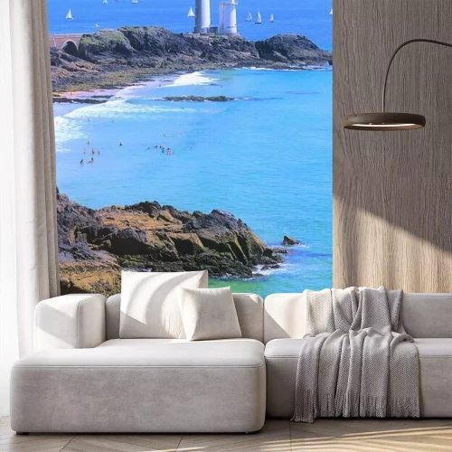 Fotobehang Vuurtoren op de achtergrond van de zee