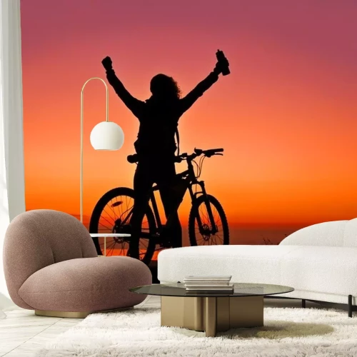 Sticker Biker-Meisje bij de zonsondergang in de buurt van het meer