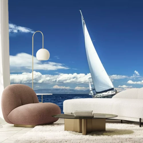 Fotobehang Een jacht tegen de lucht