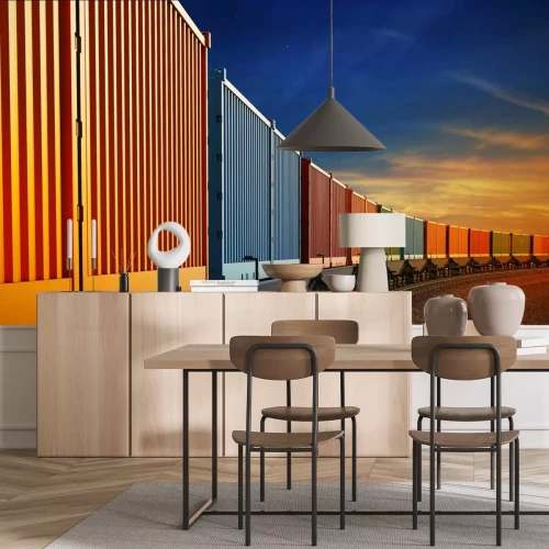 Fotobehang Kleurrijke goederentrein bij zonsondergang