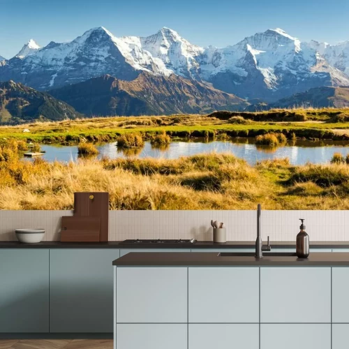 Fotobehang Open vlakte en bergen in sneeuw