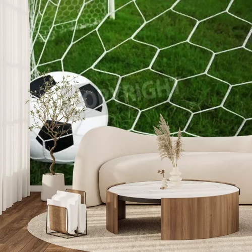 Fotobehang De bal die in het doel valt