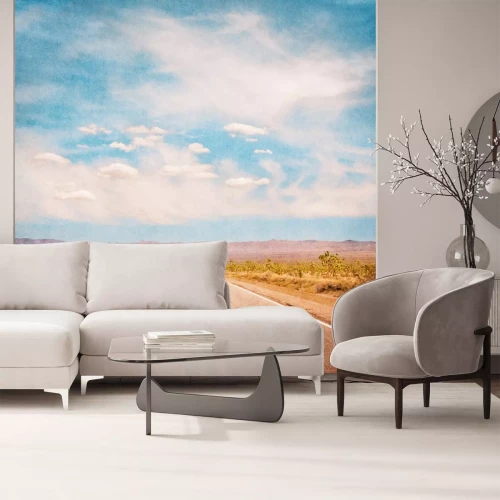 Fotobehang Een lege woestijn weg met een geweven achtergrond en een subtiele vignet.