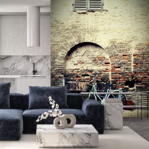 Fotobehang Retro fiets bij de muur