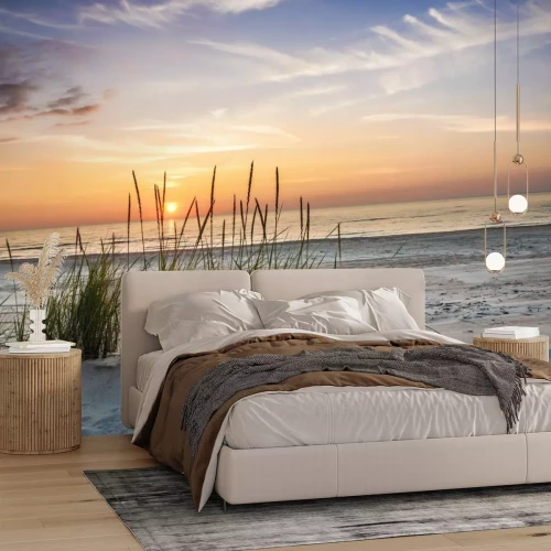 Fotobehang Een schilderachtige zonsondergang boven de zee